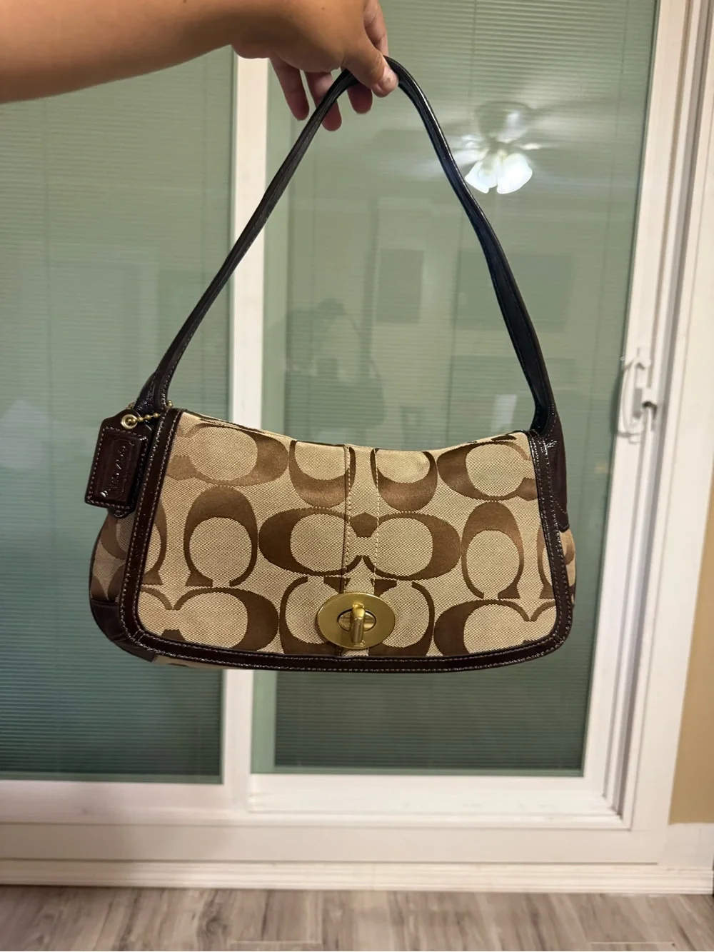Coach Brown Signature Canvas Shoulder Bag with Gold Hardware